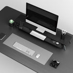 large-black-desk-shelf-monitor-stand-in-home